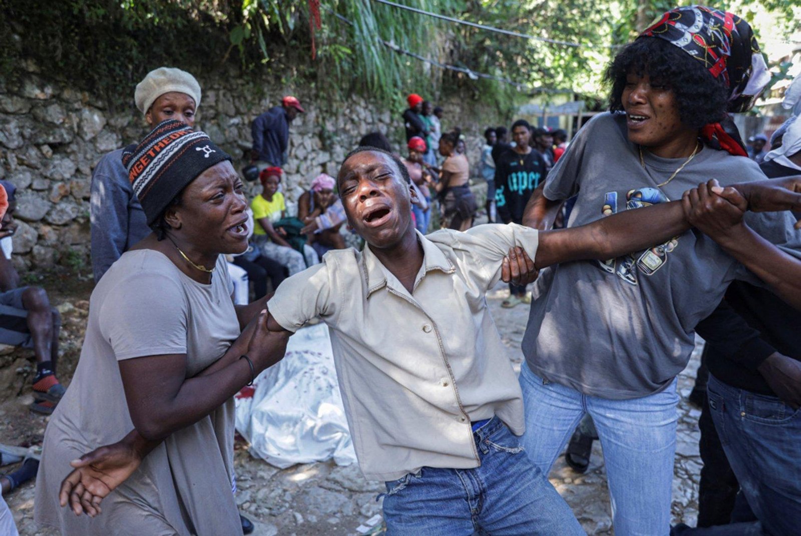 Brutal gang attack on strategic Haiti hillside leaves at least 30 dead