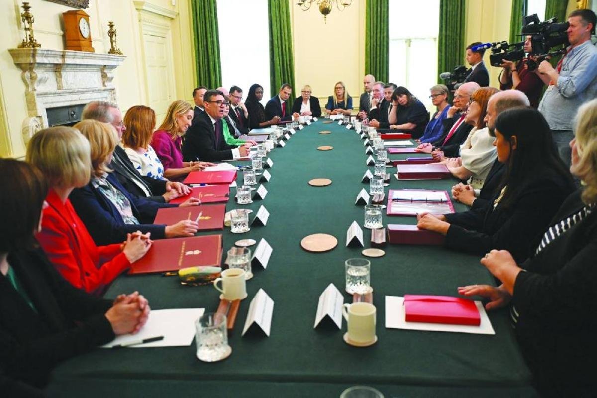 UK PM Burnham unveils energy tax cut, tells ministers to cut living costs