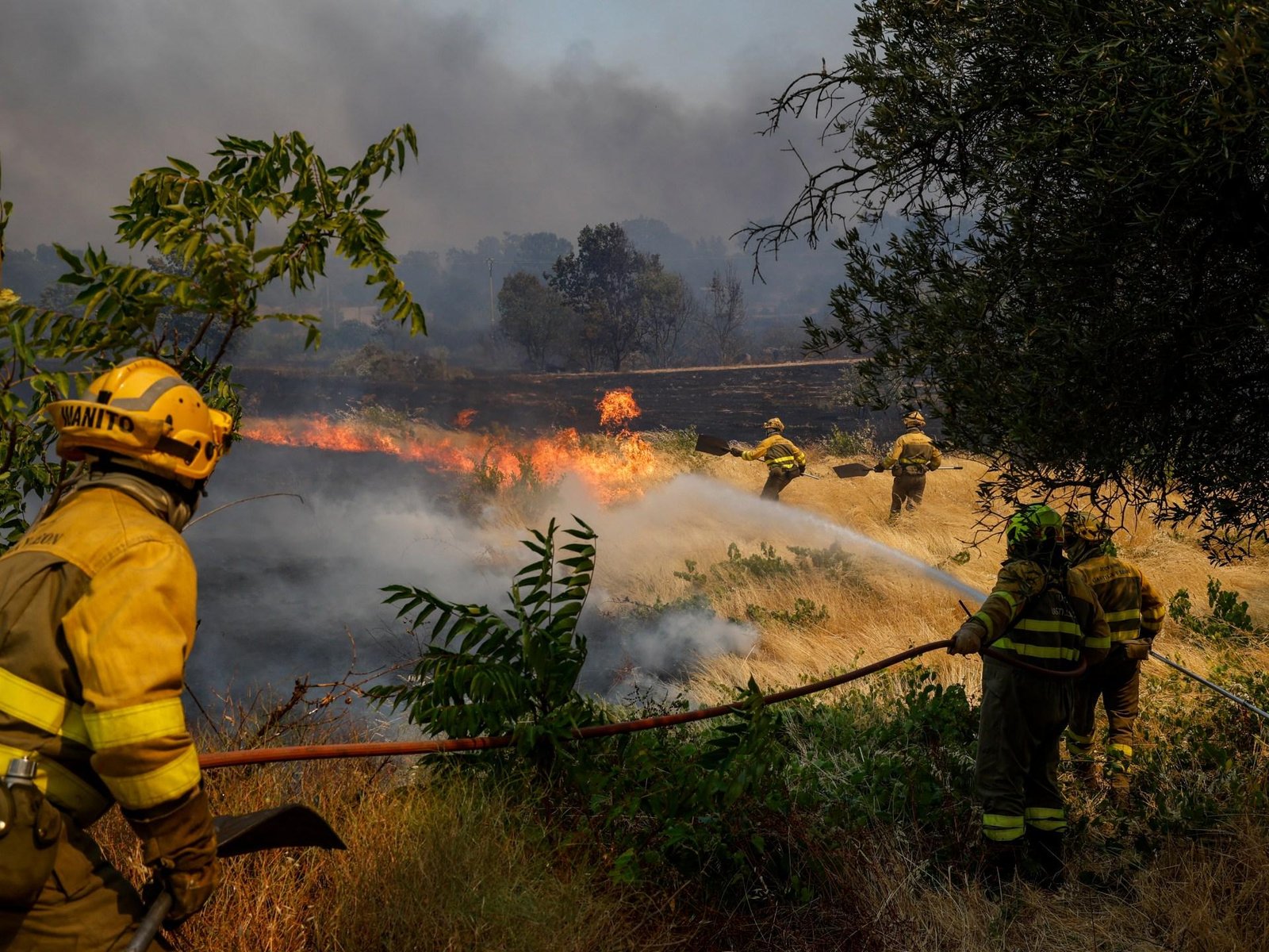 Spanish police accuse tractor driver of sparking wildfire as blazes spread