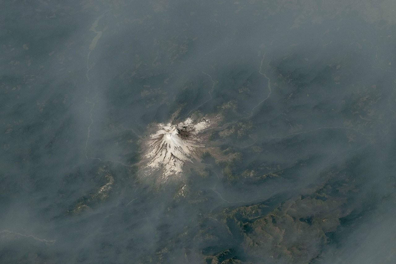 Cascade Volcanoes Shrouded in Smoke