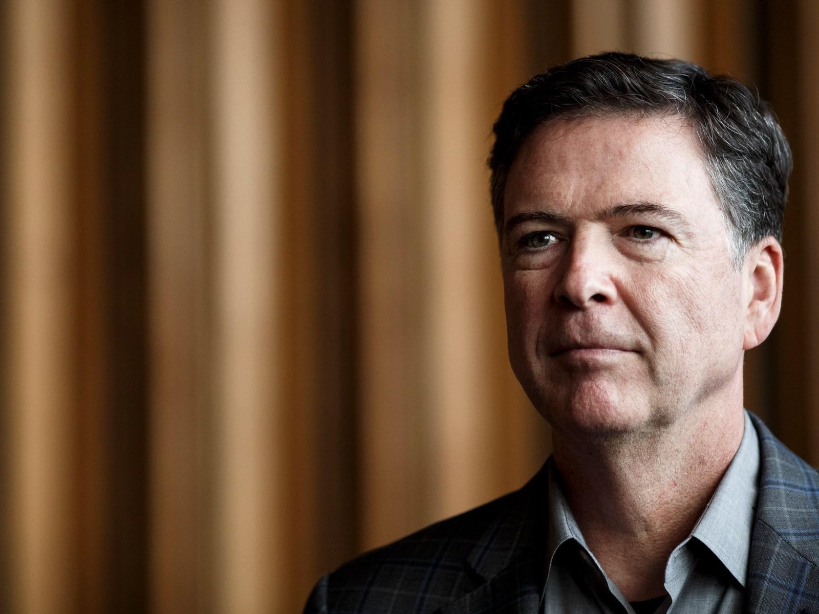 US Department of Justice defends prosecution of Comey over seashell post